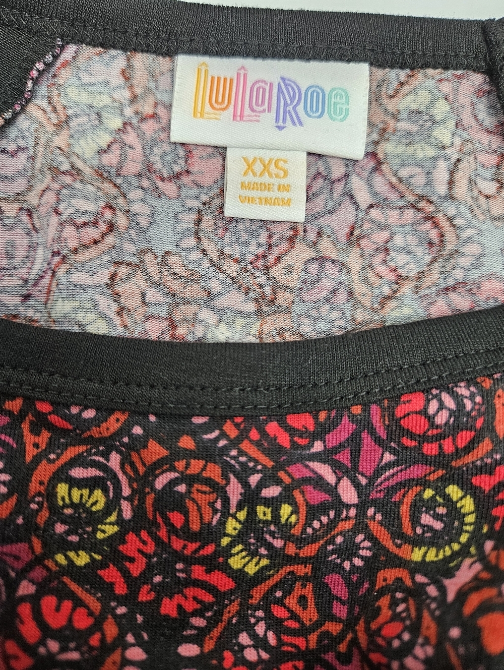 LuLaRoe XXS Randy T Black Top with Red, Pink & Yellow Floral Swirls - Picture 5 of 7